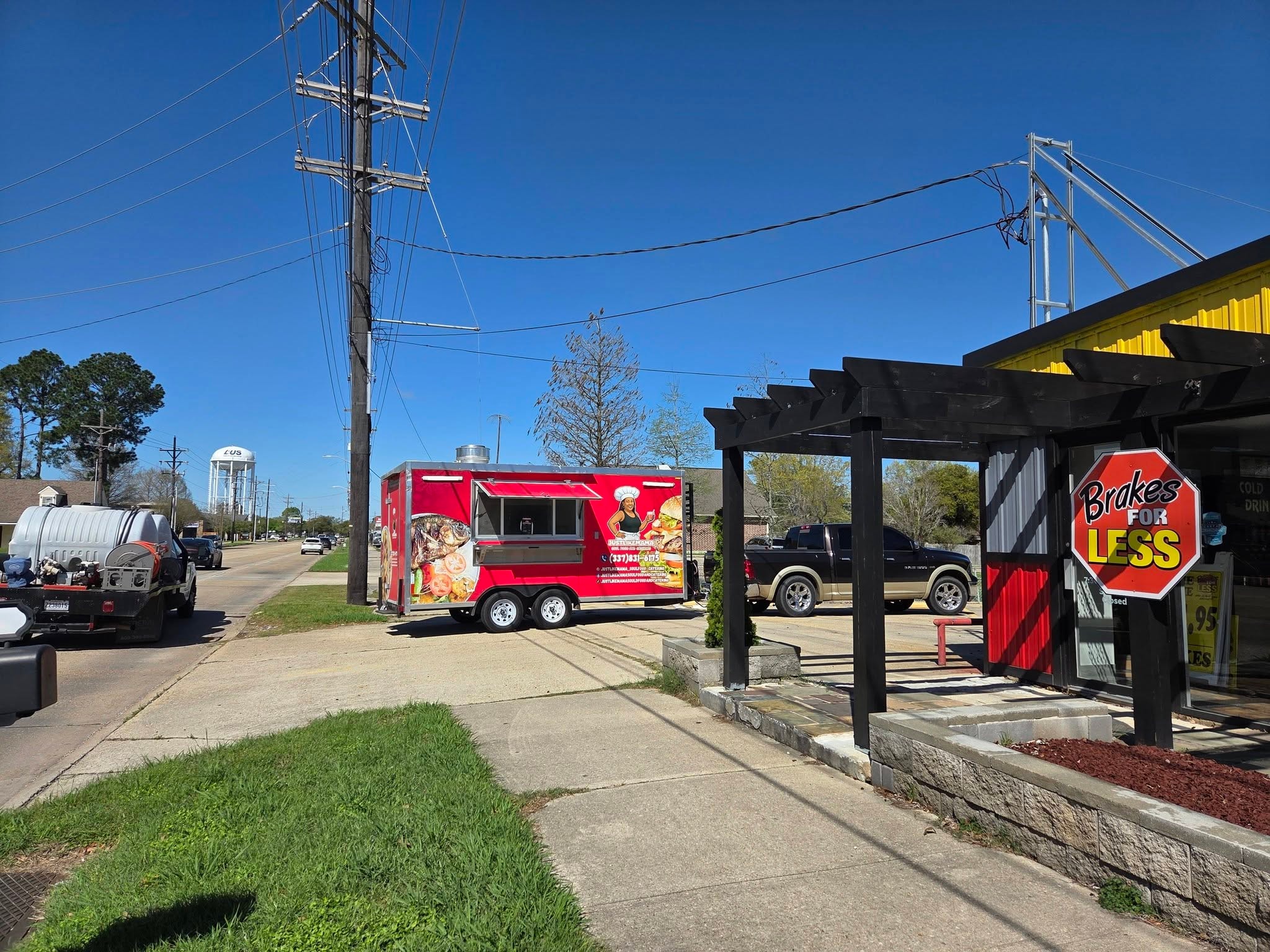 Red Cajun food truck parked at BFL Stop & Go Car Care Guilbeau Road